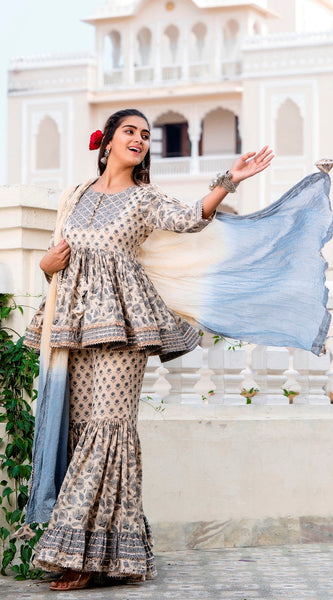 Svarchi Beige Peplum Kurta with Flared Sharara and Mulmul Dupatta