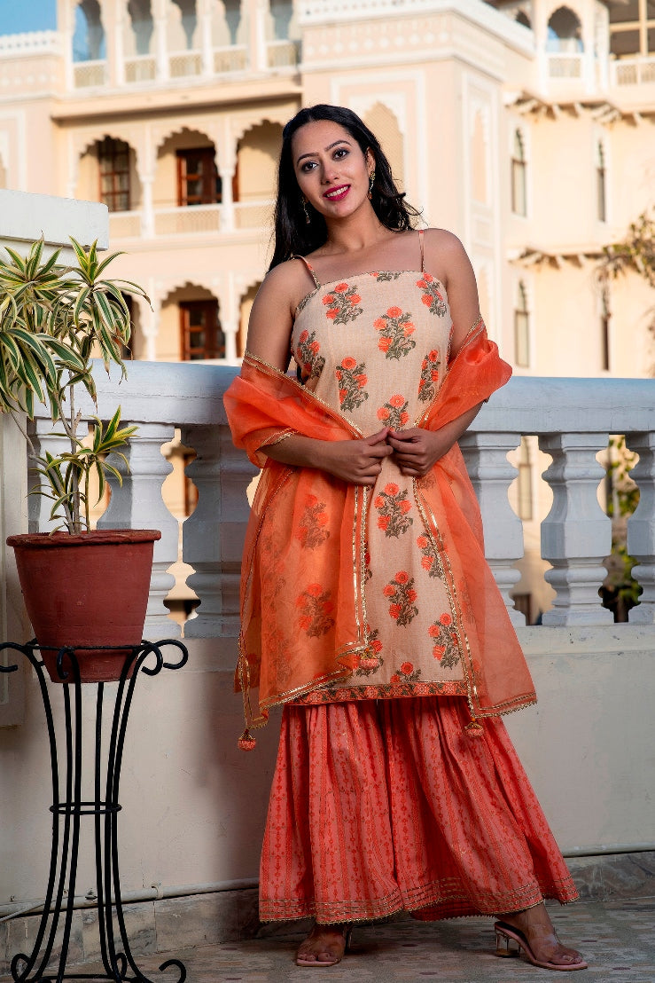 Svarchi Apricot Coral Orange Premium Cotton Gold Foil Printed Suit Set With Organza Dupatta