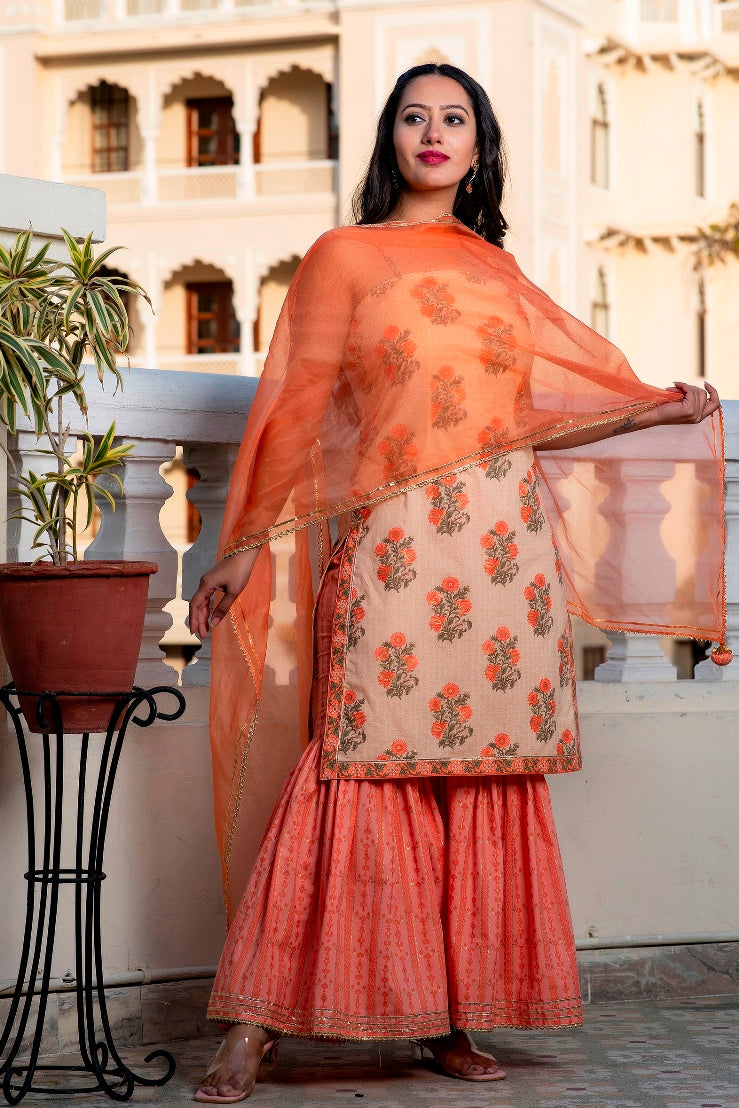 Svarchi Apricot Coral Orange Premium Cotton Gold Foil Printed Suit Set With Organza Dupatta