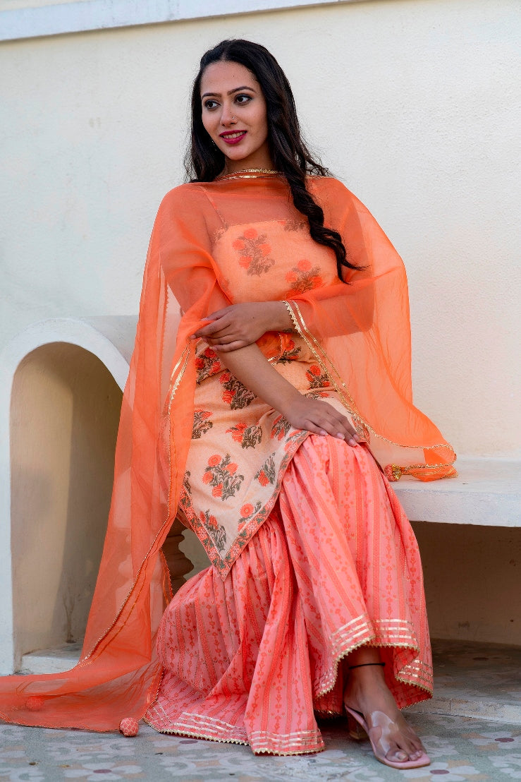 Svarchi Apricot Coral Orange Premium Cotton Gold Foil Printed Suit Set With Organza Dupatta
